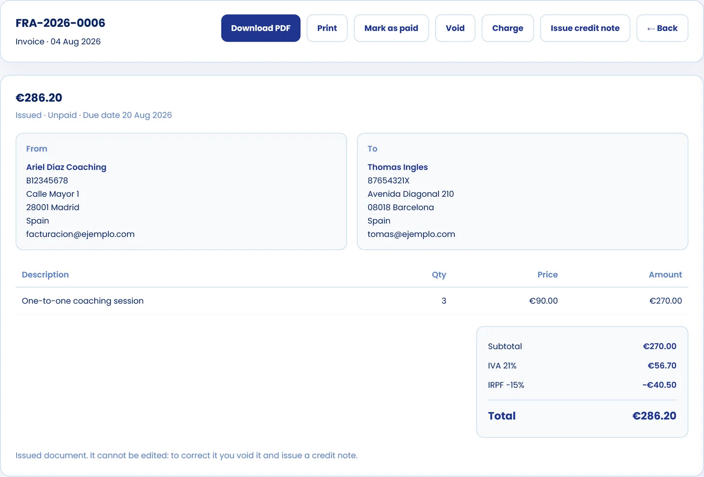 Issued invoice in CoachPro Tools with the issuer and client details, the item, subtotal, VAT, IRPF withholding and total, and the buttons to download the PDF, charge, void or issue a credit note